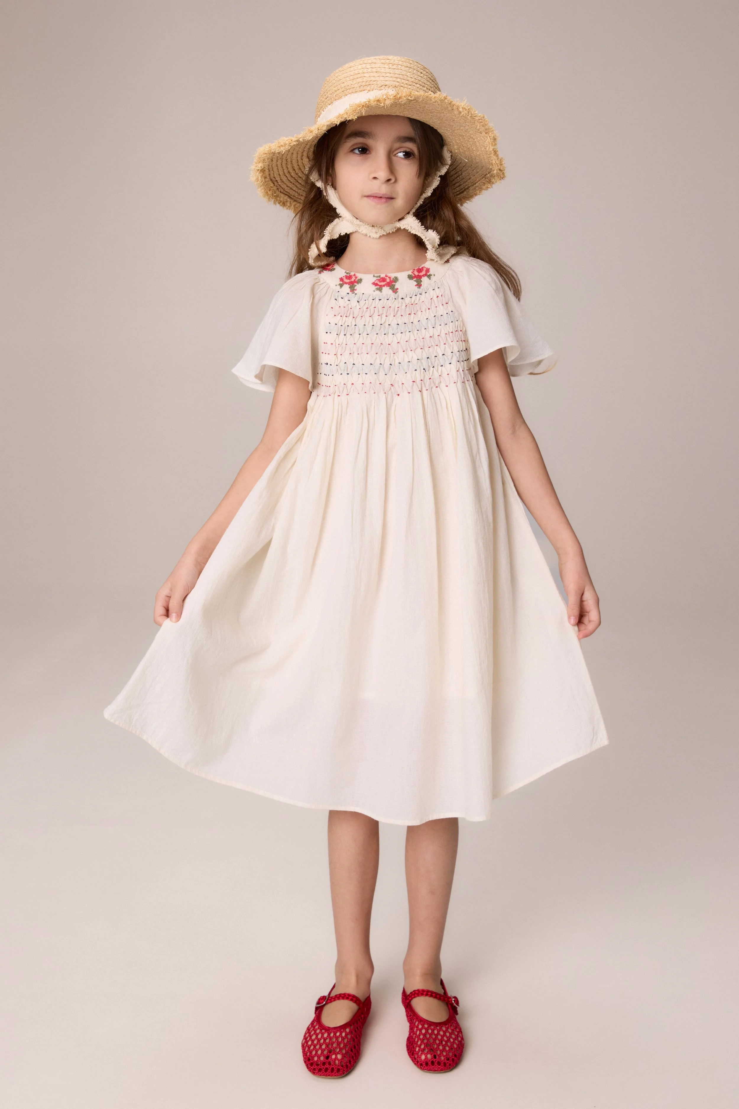 PERNILLE BEIGE/RED SMOCKED FLUTTER SLEEVE DRESS - Image 2